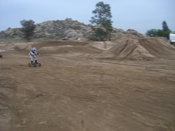 RexKwando gets bungeed in for his first backflip ramp to dirt attempt at Ryan Villopoto's supercross practice track in Cali!