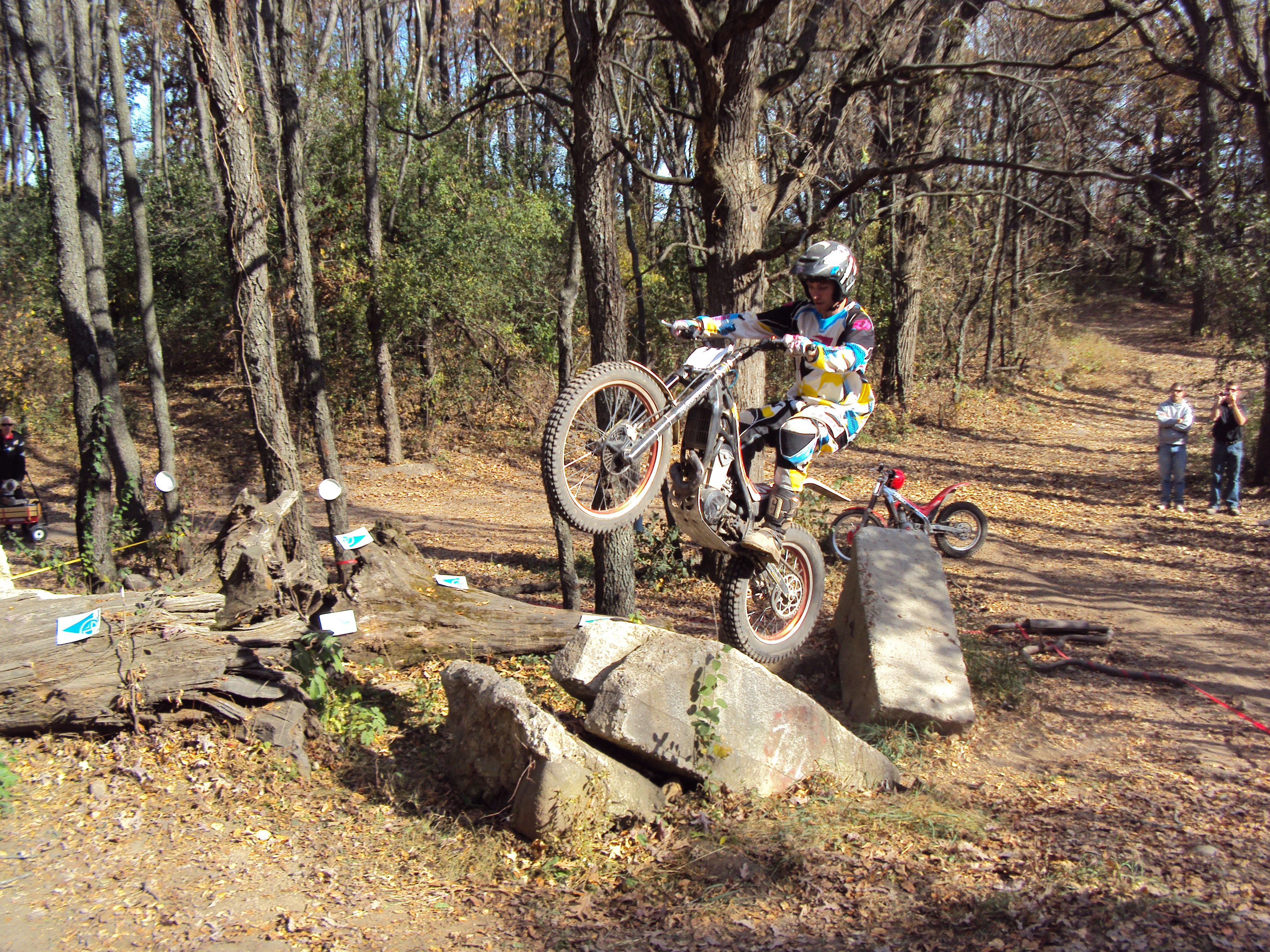 Phil holds the front wheel up over section 4 chunks